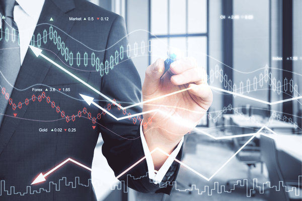 Pebisnis menulis grafik trading, menentukan leverage yang ideal - Ultima Markets